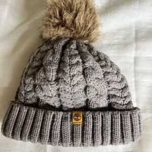 Timberland Women`s Cable Knit Cuff Pom Beanie 
Fleece lined Color Gray